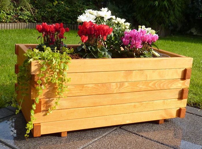 Abgebildete Blumen-Deko nicht im Lieferumfang enthalten.